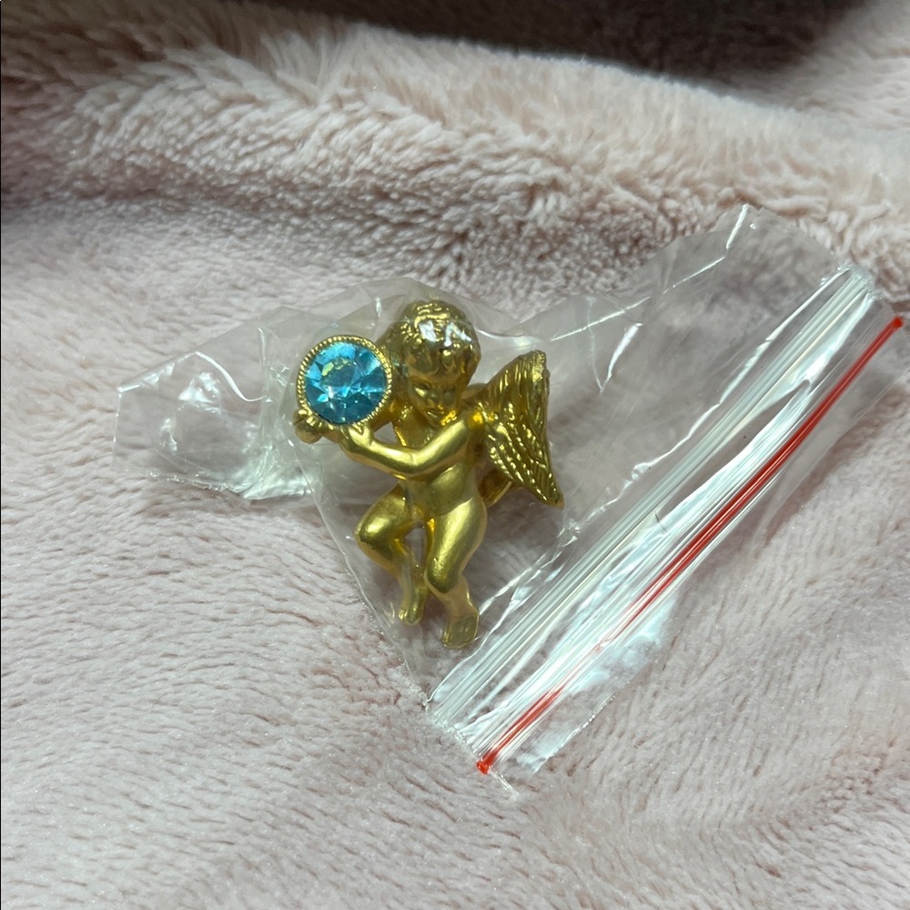 Avon Gold Angel Brooch with Blue Gem